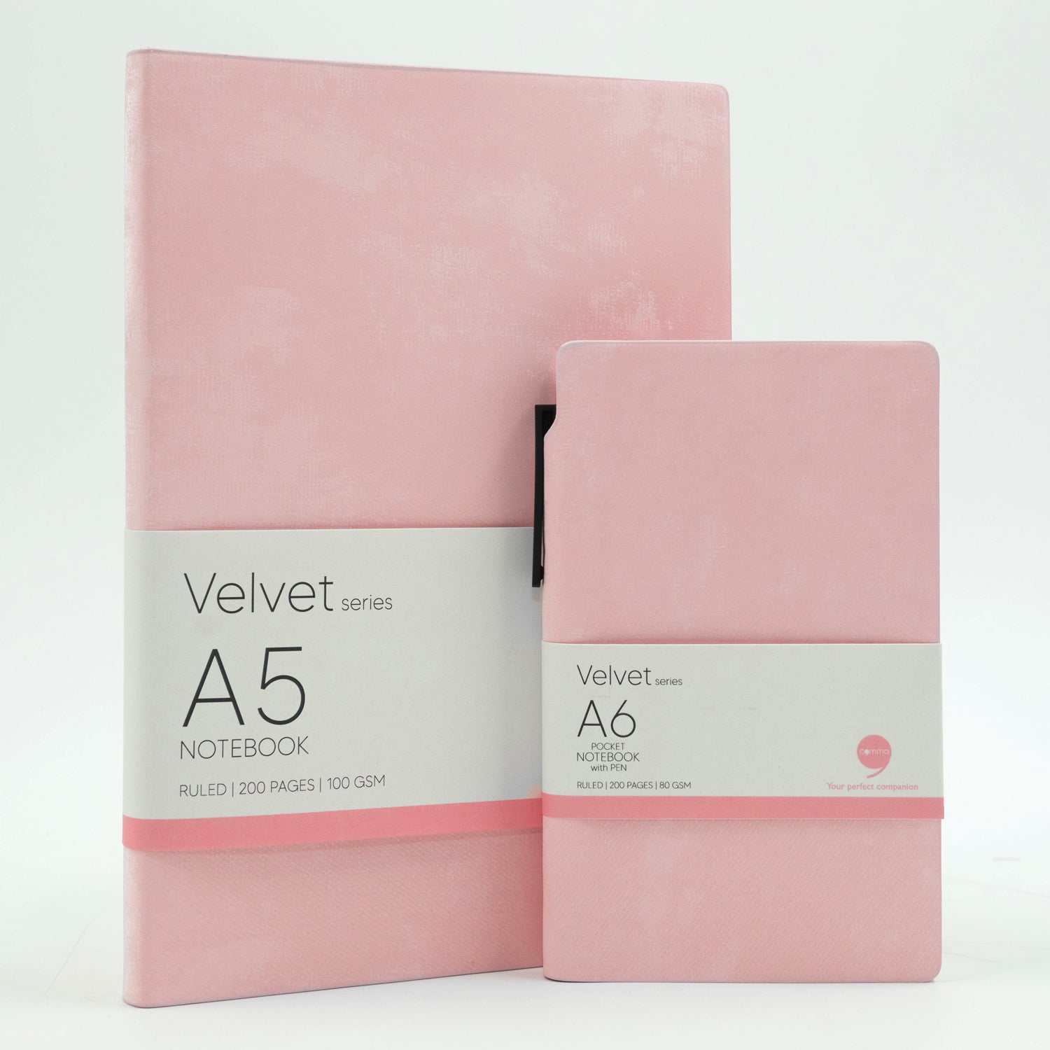 A set of two pink velvet notebooks, one A5 size and one A6 size, with a pink
 ballpoint pen and labeled 'Velvet Series A5' and 'Velvet Series A6' respectively.