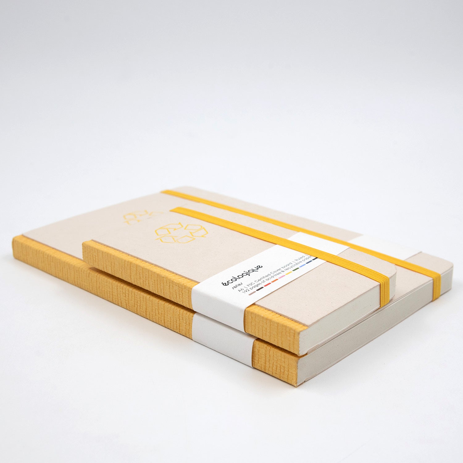 Two notebooks with yellow straps on a white background