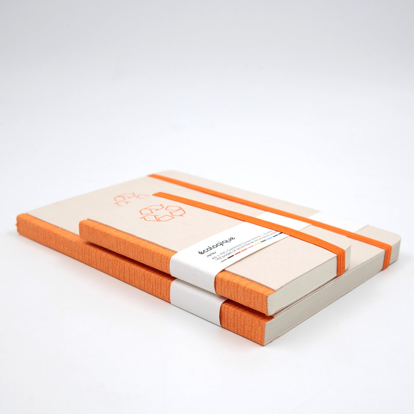 Two notebooks with orange accents on a white background