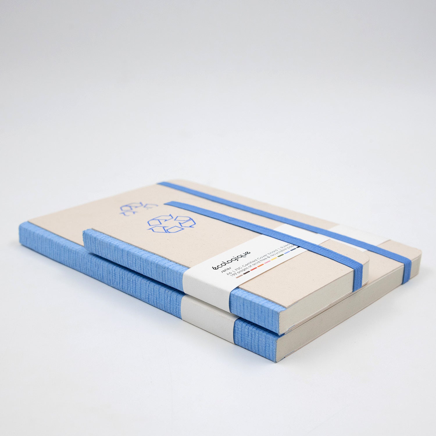Two notebooks with blue accents on a white background