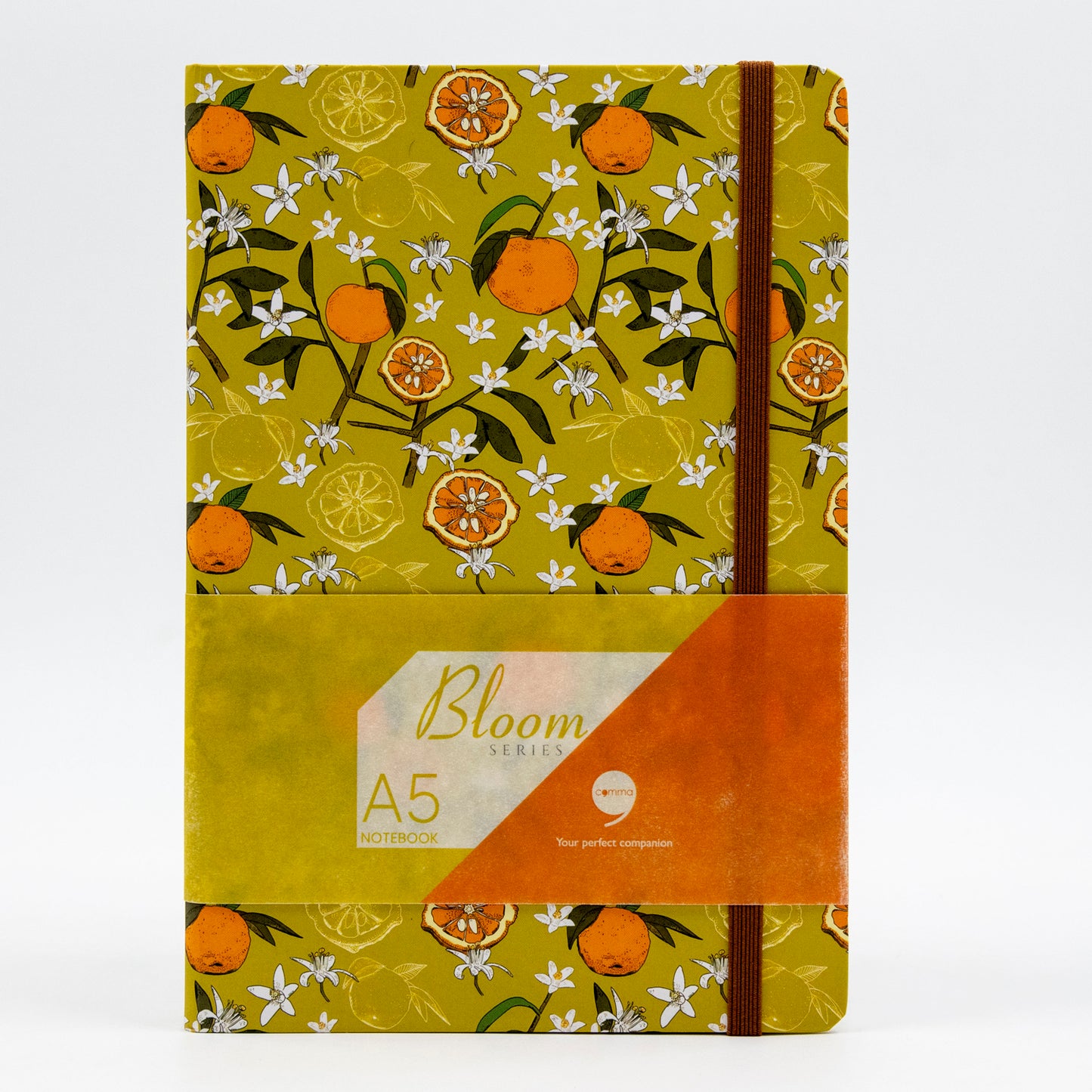 A5 size hard bound notebook with a lime green cover featuring a floral design and the brand 'Comma' visible.