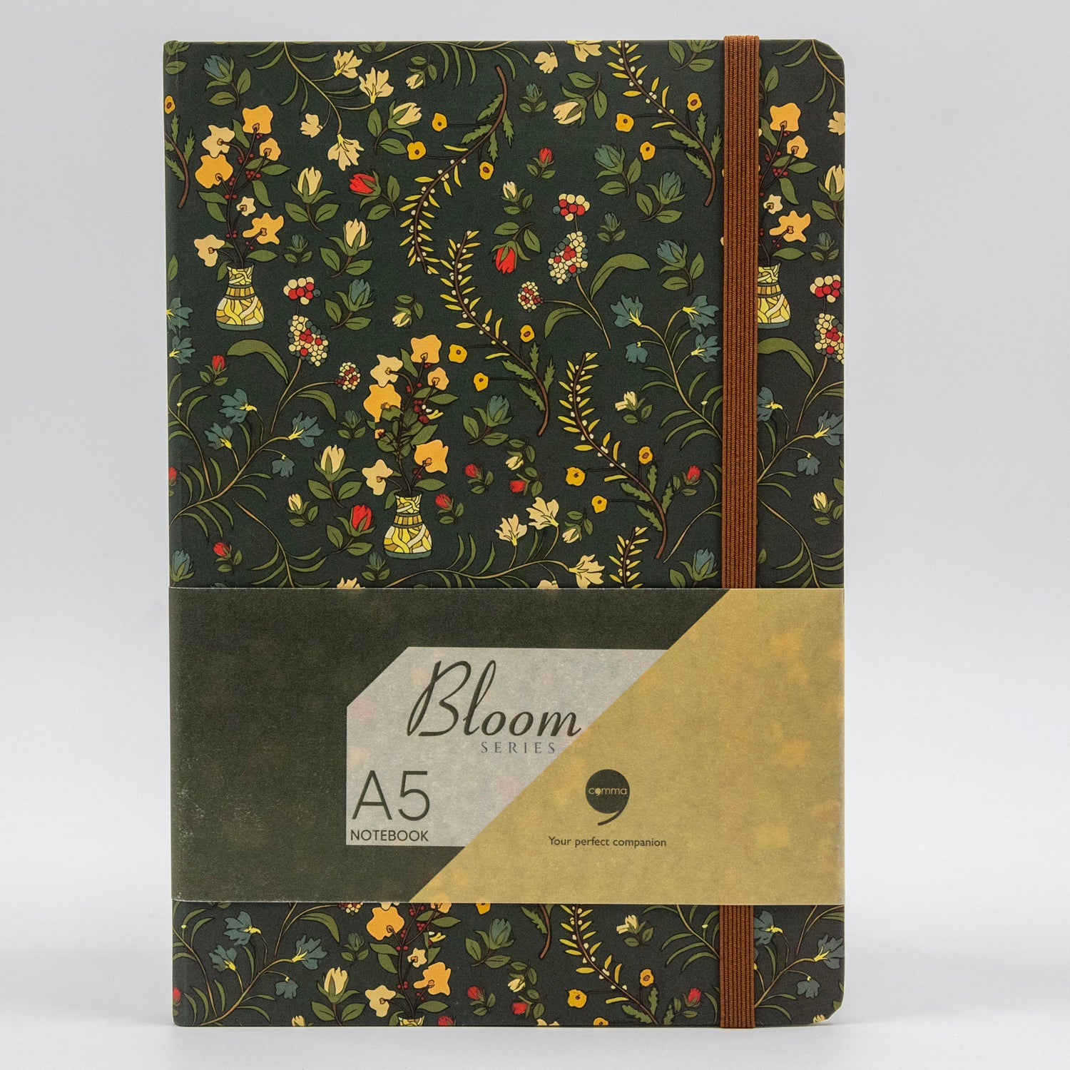 A5 size hard bound notebook with a dark green floral-themed design and a brown hard cover.