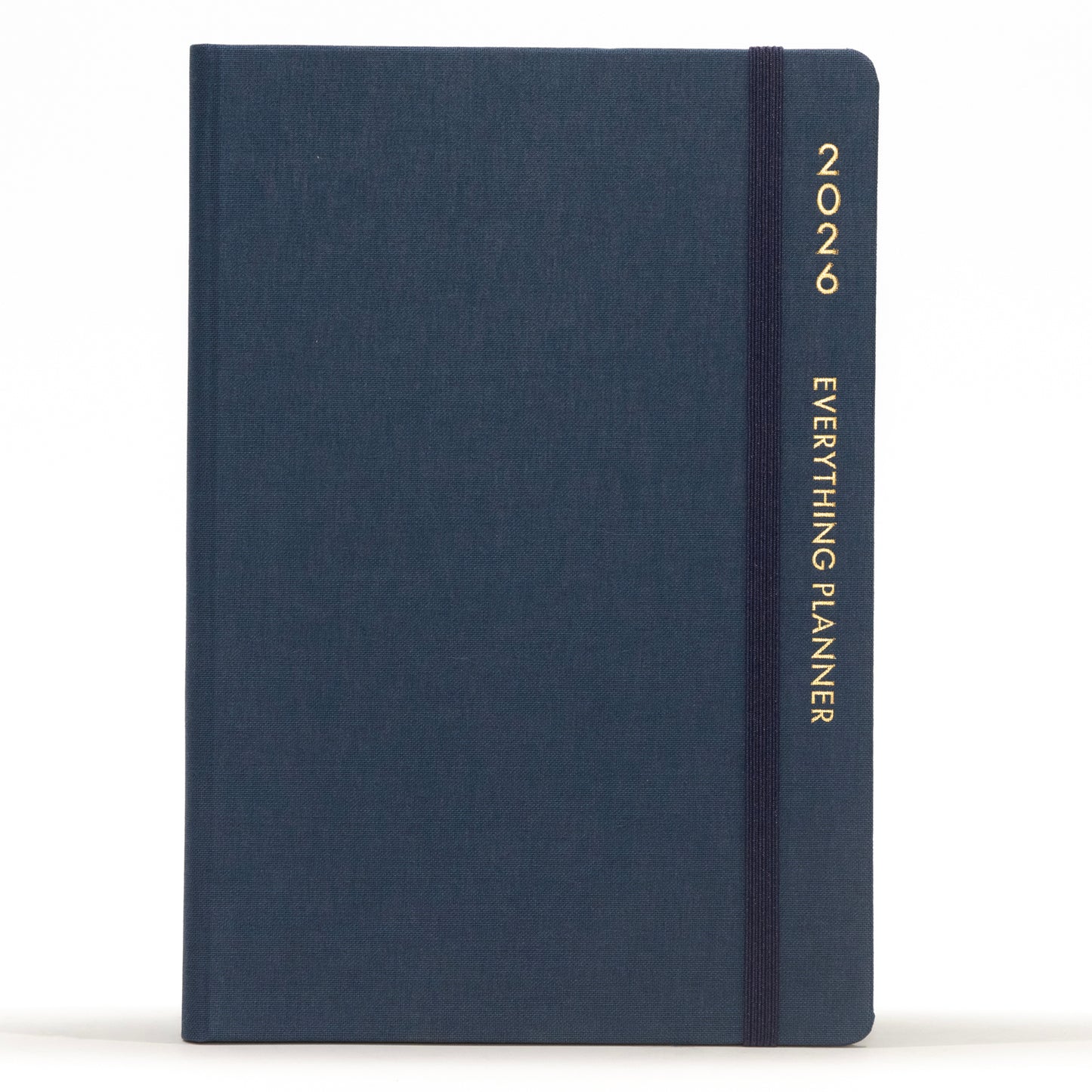 Navy blue planner with 'COMMA' branding on a white background