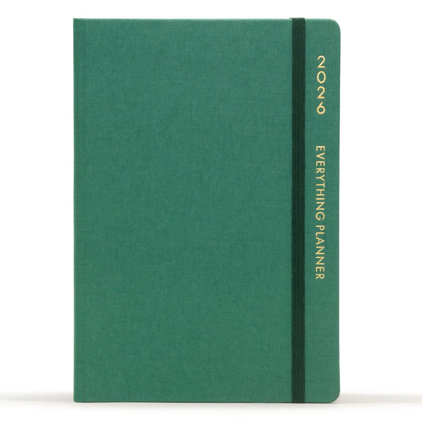 Green planner with 'Comma' branding on a white background