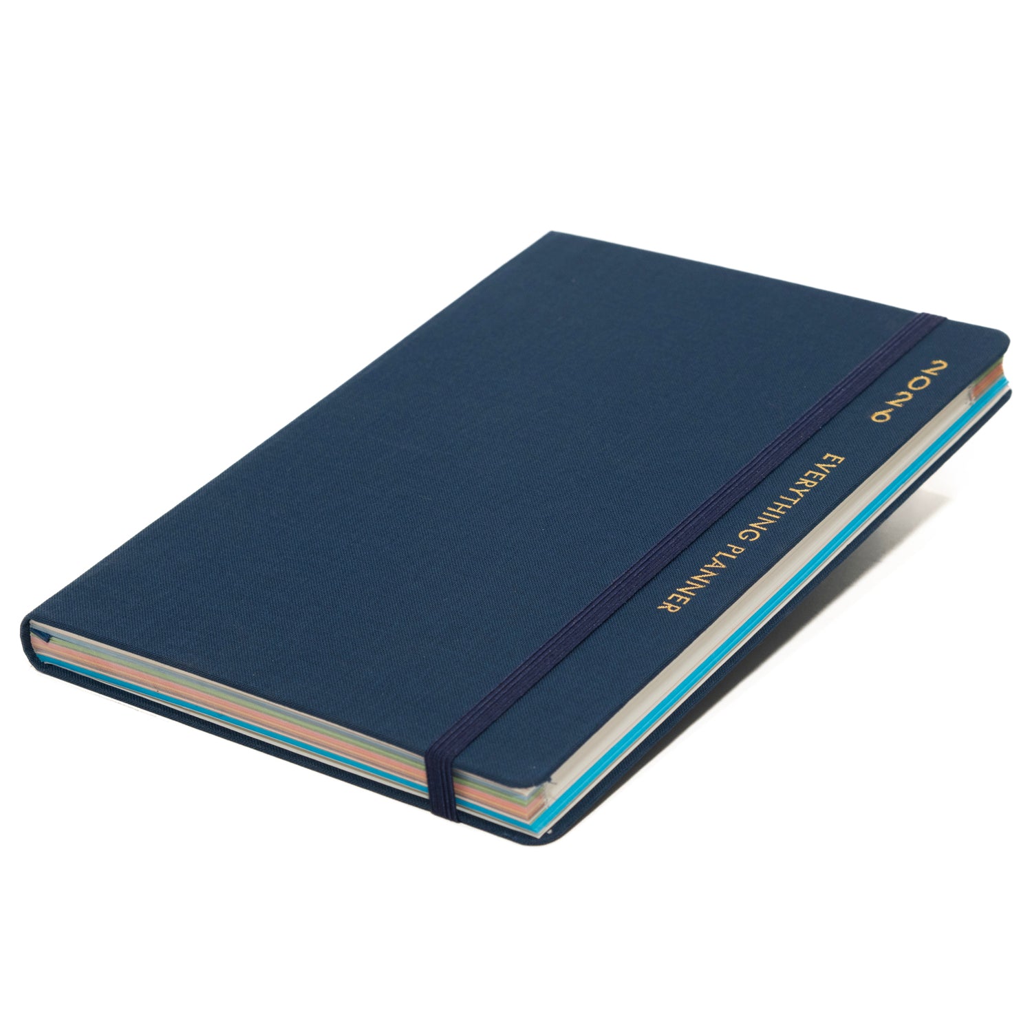 Blue notebook with gold embossed text on a white background