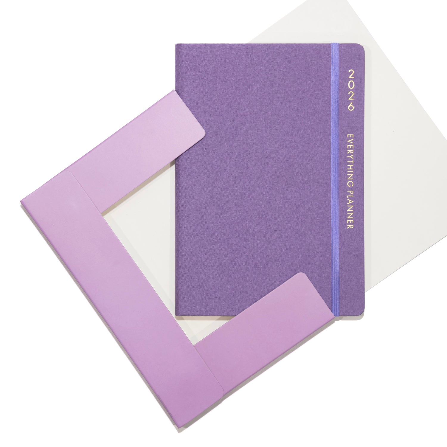 Purple planner with matching envelope on a white background