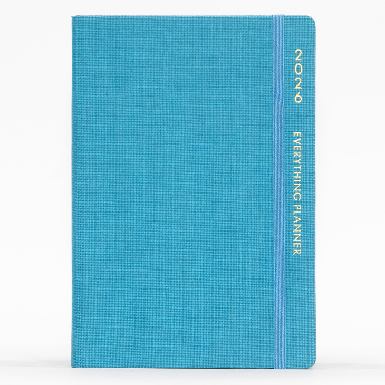 Blue planner with 'COMMA' branding on a white background