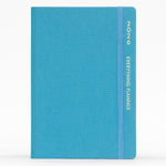 Load image into Gallery viewer, Blue planner with &#39;COMMA&#39; branding on a white background
