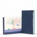 Load image into Gallery viewer, Blue planner with a tree illustration on a white background
