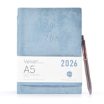 Load image into Gallery viewer, Blue A5 daily planner with a pen on a white background
