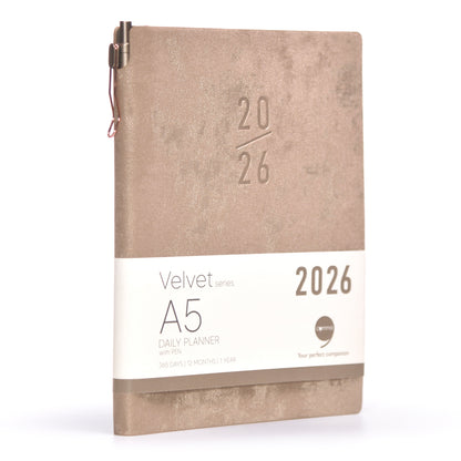 Beige planner with '2026' embossed on the cover on a white background